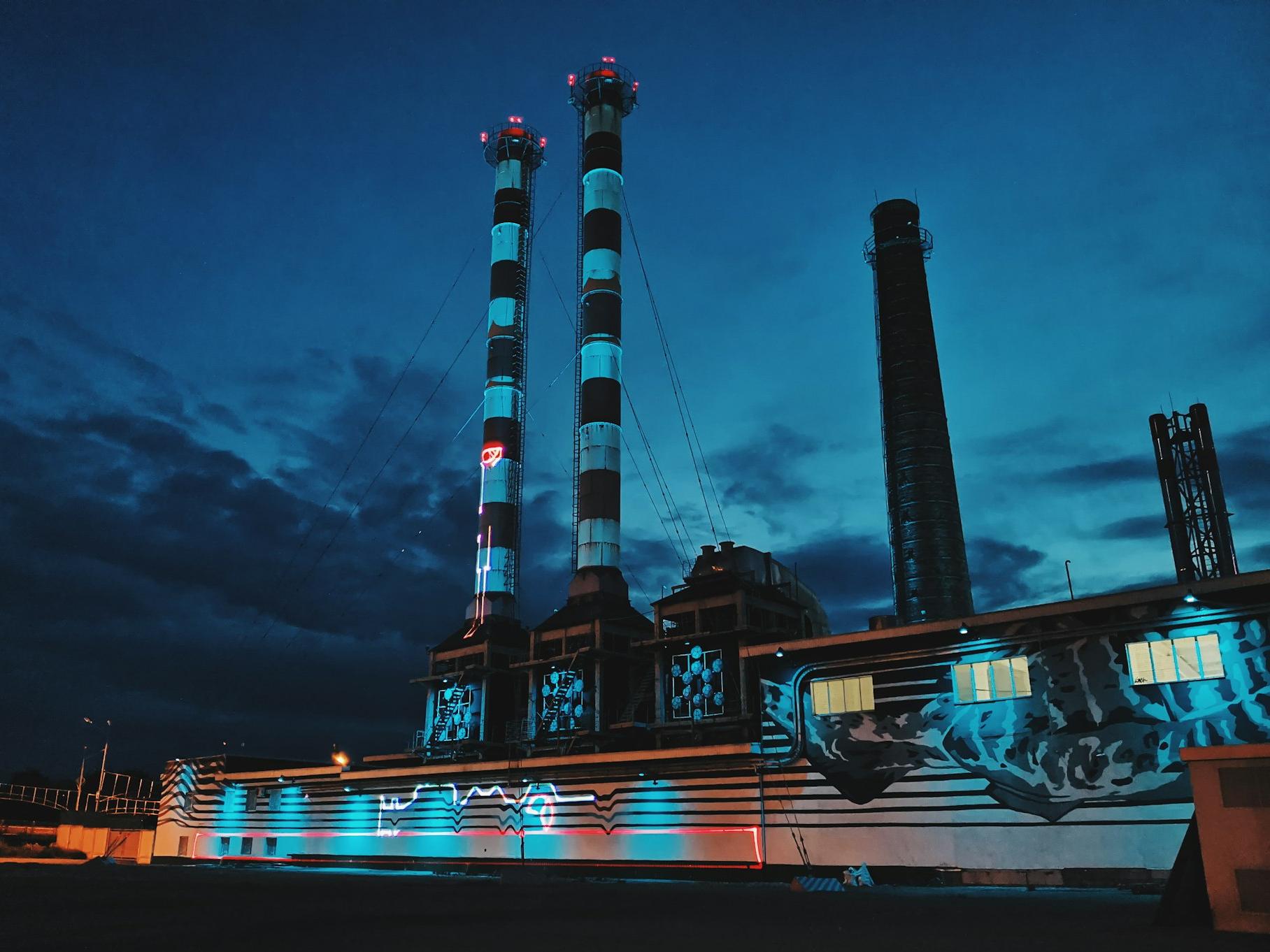 white and black ship on sea during night time